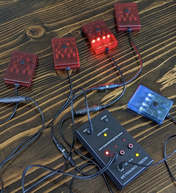 QuizEquipment.com set — black Quizbox controller with eight red buzzer pads